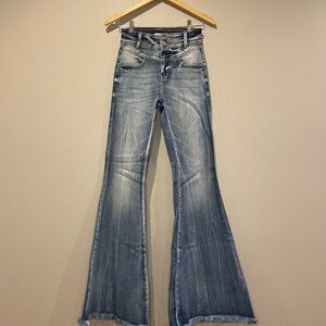 KanCan button fly washed out distressed hem flare jeans